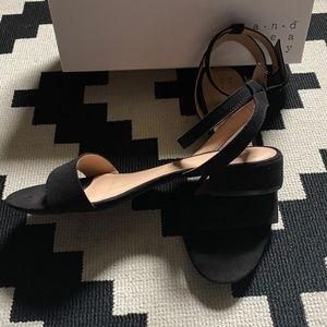 Black suede flat sandals with ankle strap by a.n.d e w a y, size 8